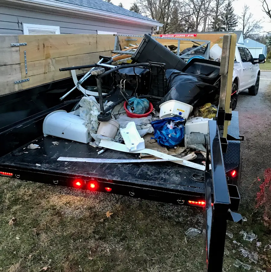 Roll-off dumpster delivered to a residential driveway in Lackland AFB